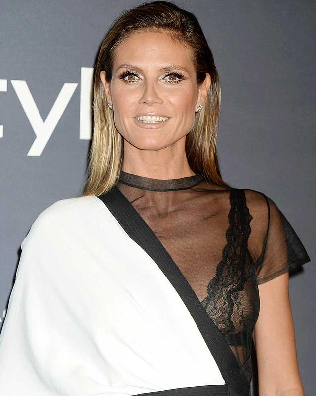 Heidi Klum Single Nipple Peek in Black Bra free nude pictures